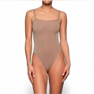 Skims Sheer Sculpt Square Neck Low
Back Thong Bodysuit color sienna size 2X NWT